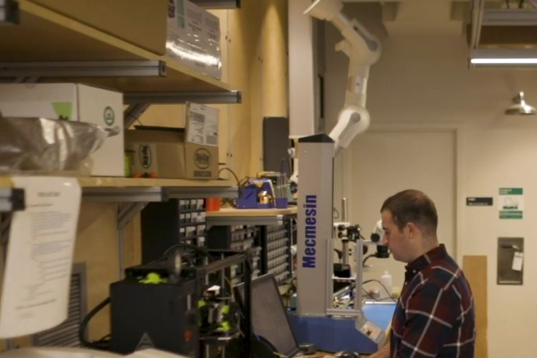 Student in computer engineering works in lab