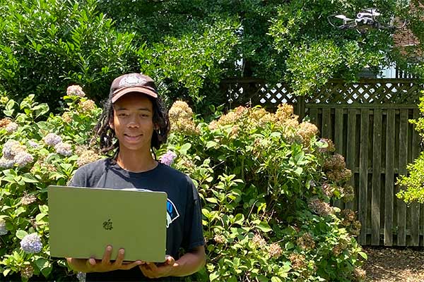Zachary Walker-Liang outside with his drone